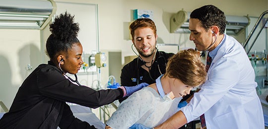 UCF nursing students with simulation manekin