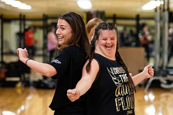 Two UCF students dancing