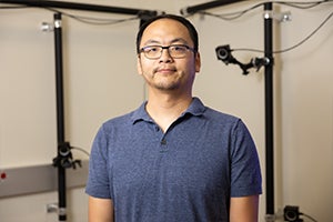 A photo of Qiushi Fu, a professor in UCF’s Department of Mechanical and Aerospace Engineering within the College of Engineering and Computer Science, aims to improve the quality of life for people living with limited limb mobility with his new research on bimanual coordination that began in March as part of a National Institutes of Health grant. 