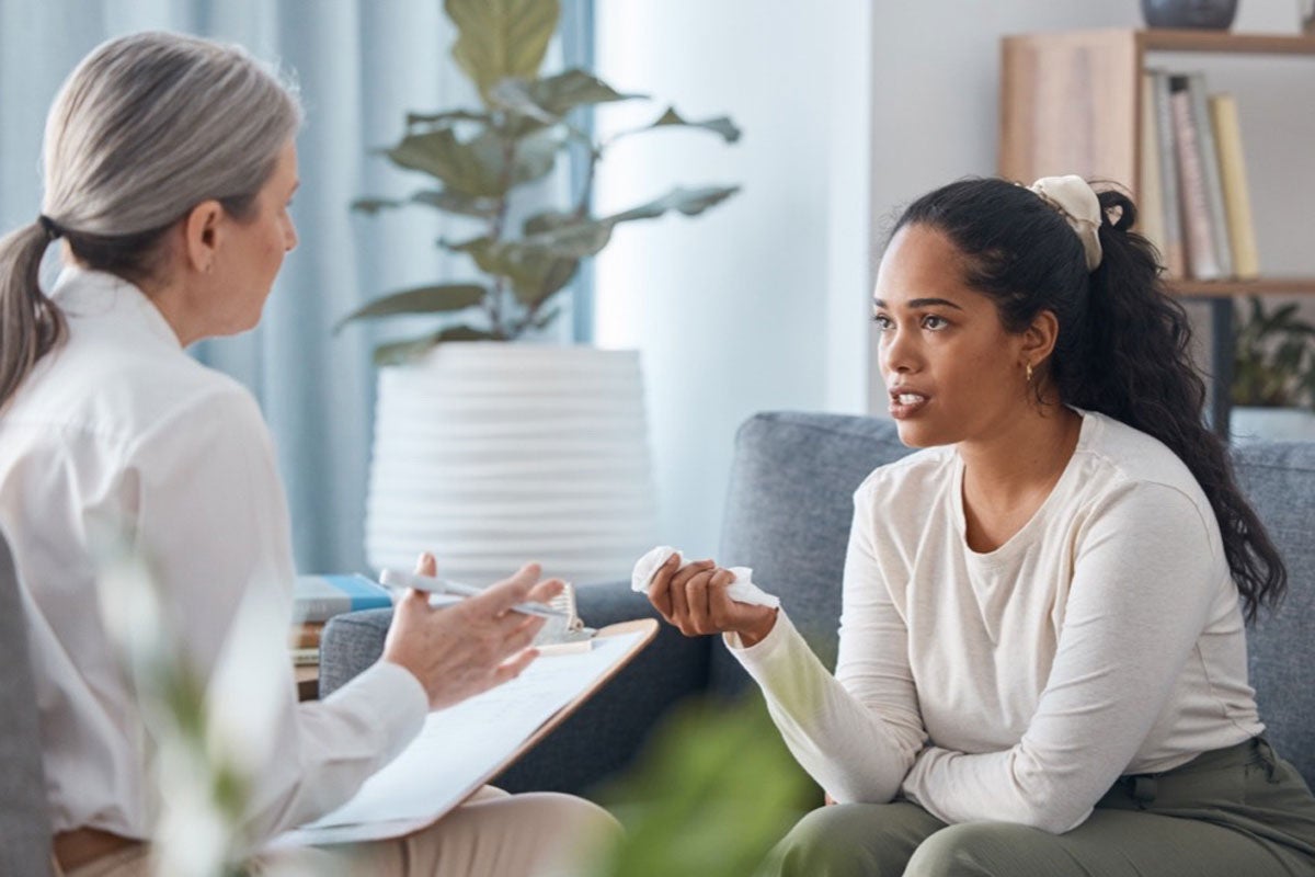 A doctor speaking with a patient