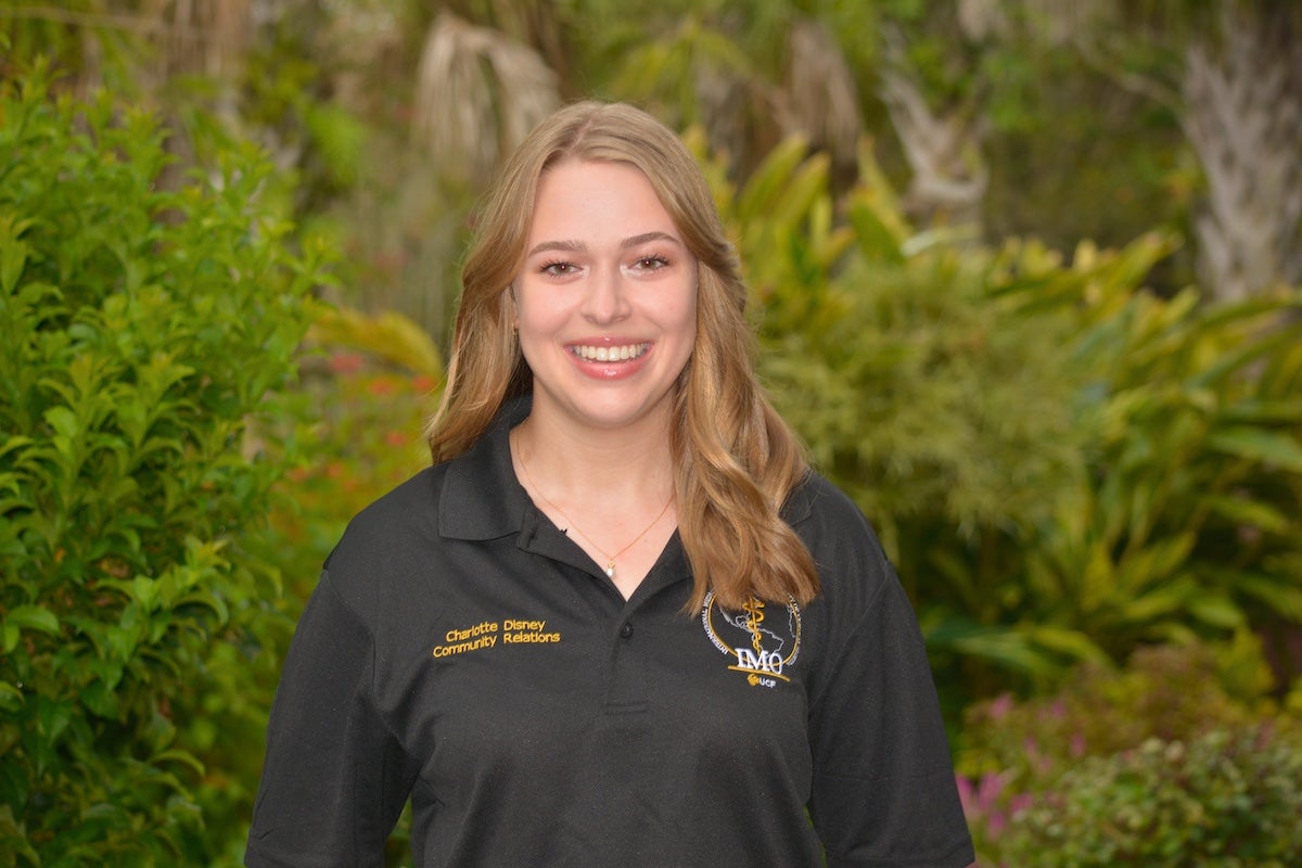 A female UCF student poses for a photo