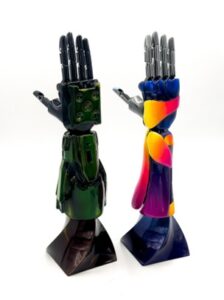 “Halo” video game-inspired arm (Left) and lava lamp-inspired arm (Right). 