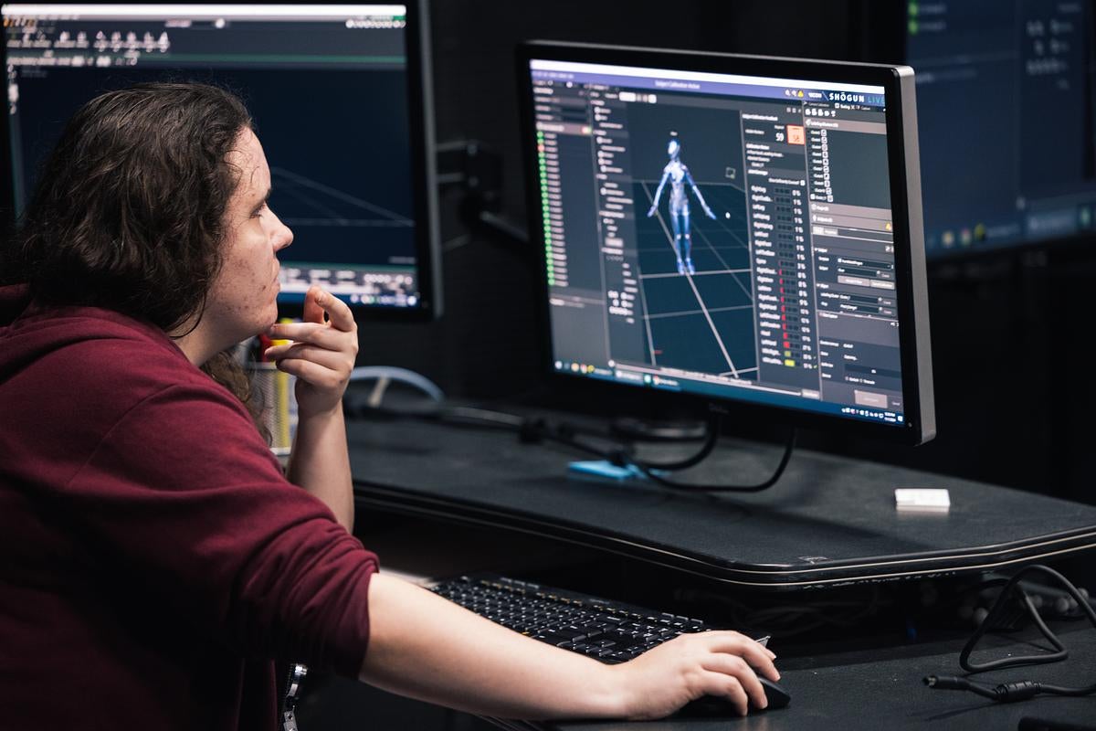 A student working at a computer at FIEA's studio