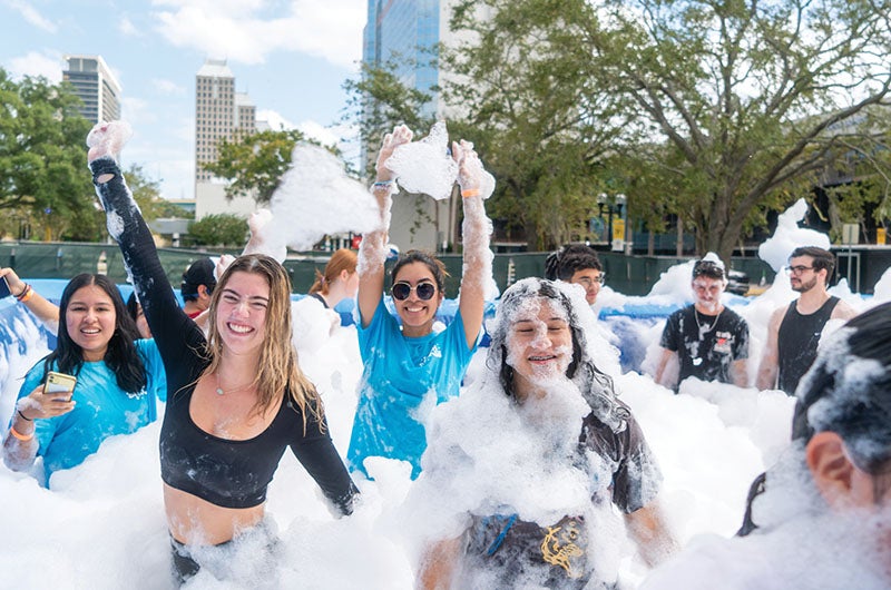 Students at the UCF Downtown foam splash