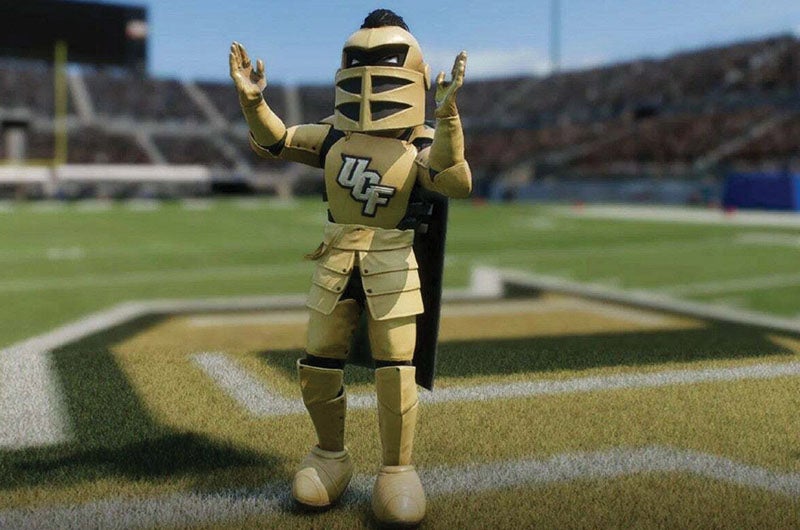 A screenshot of Knightro on the UCF football field in the game